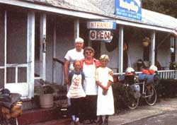 
Human awareness: Meeting people from all walks of life and learning new skills were some of our most valuable experiences. Here, Robert and Tina stand with their new friends and bakers.
